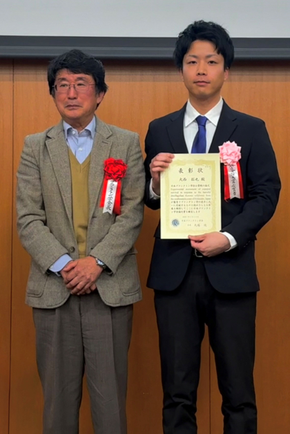 大西研究員と大塚会長との写真